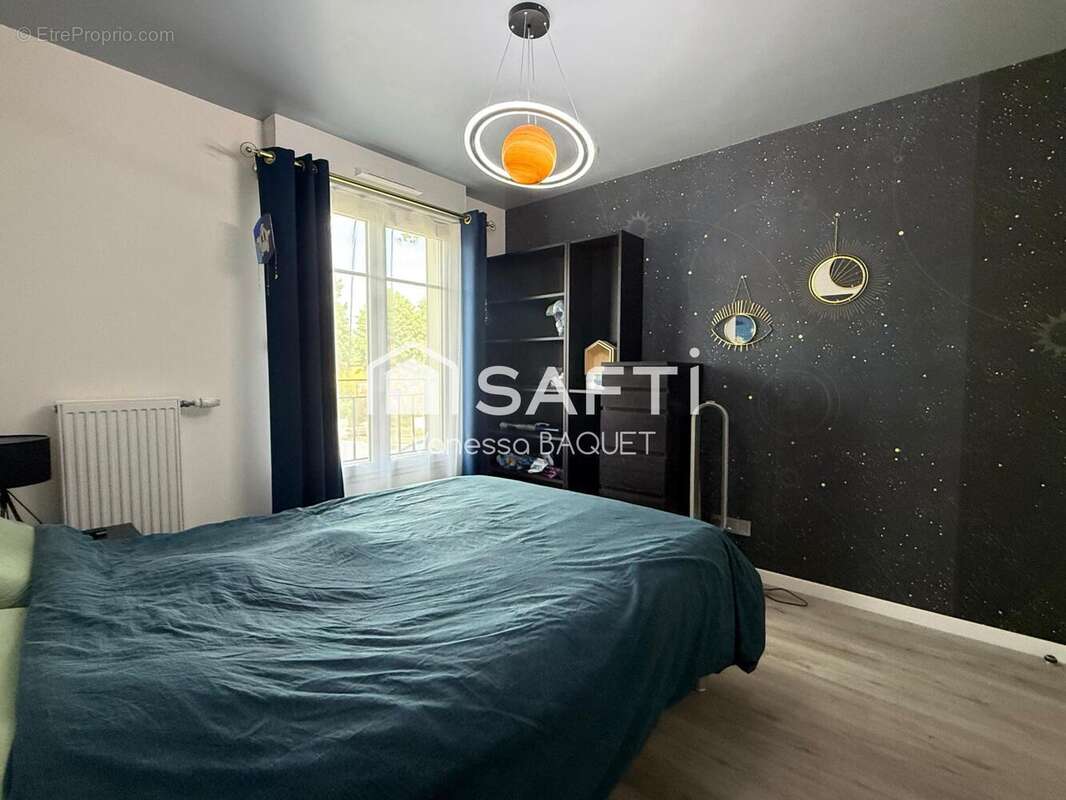 Photo 5 - Appartement à LE PLESSIS-BOUCHARD