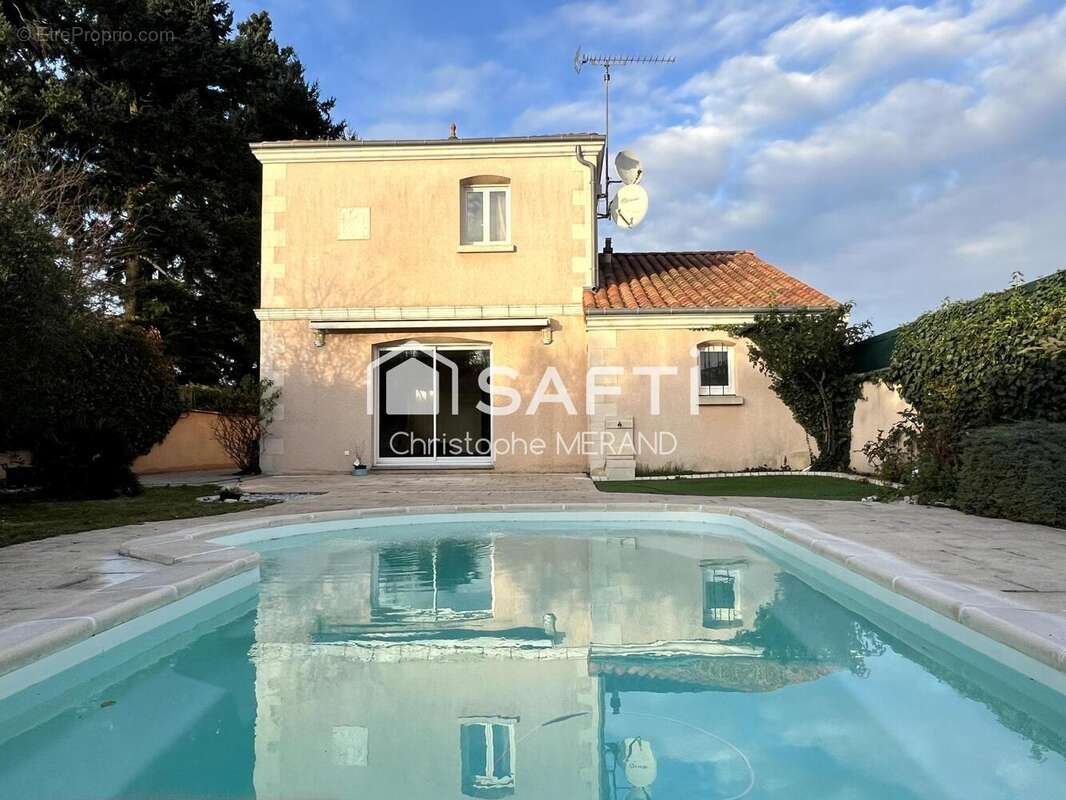 Photo 2 - Maison à DANGE-SAINT-ROMAIN