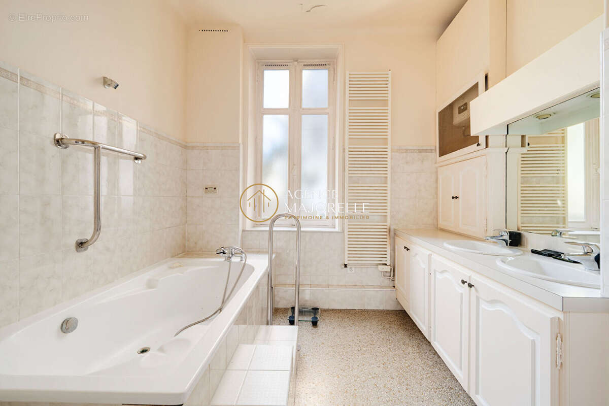Appartement bourgeois de caractère - 148 m² - 4 chambres - photo 10