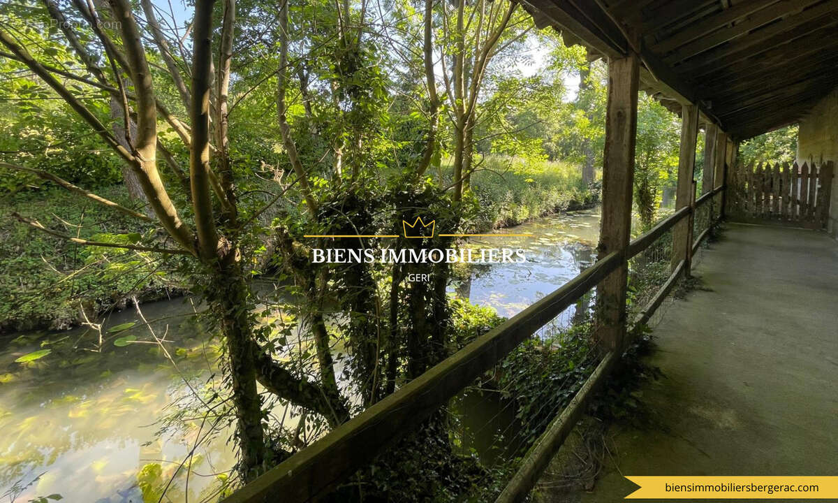 Ancien moulin de caractère avec parc et dépendances - photo 22