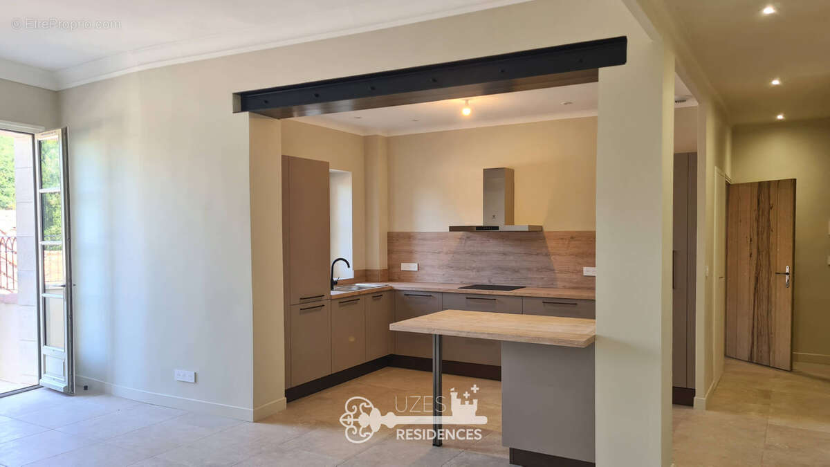 Appartement rénové de 90 m2 avec terrasse et 2 suites au cœur d'Uzès - photo 3