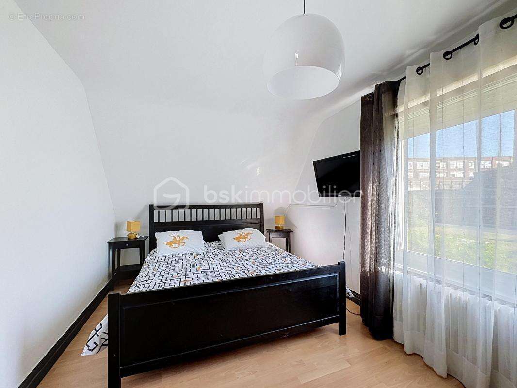 Maison lumineuse 4 chambres avec jardin, garage et combles aménageables à Tourcoing - photo 9