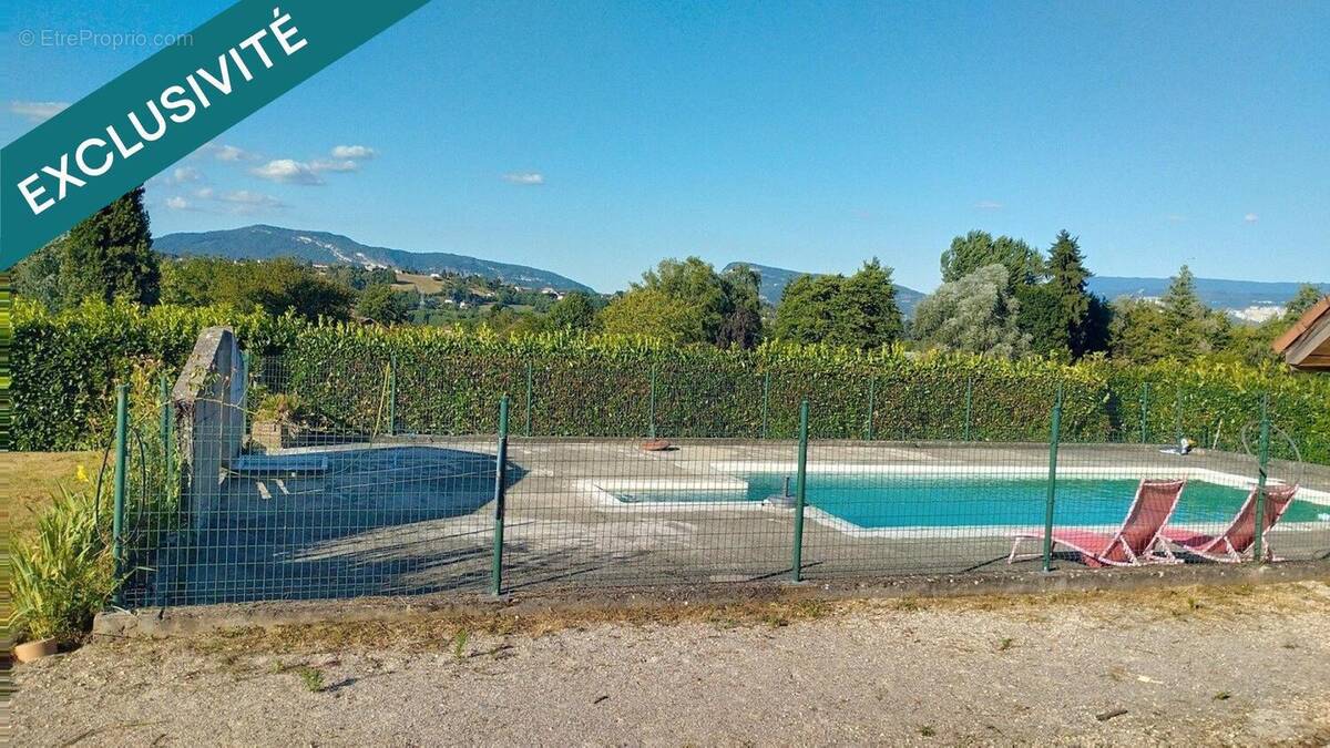 Photo 1 - Terrain à VEYRINS-THUELLIN