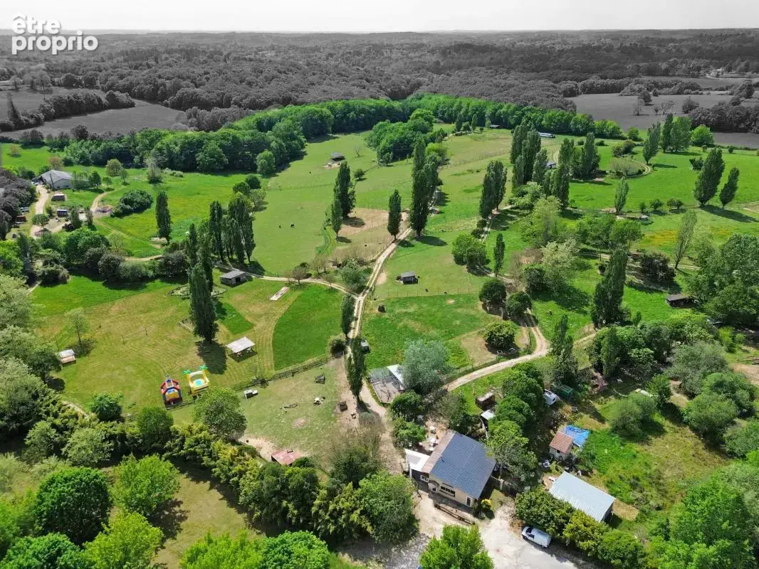 Propriété de 19,5 hectares avec étang multiples bâtiments - photo 4