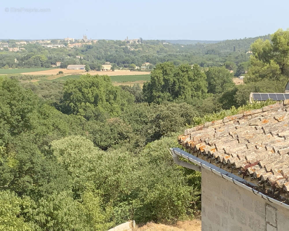 Maison en pierre à 4 km d' Uzès, jardin et grand garage. - photo 8