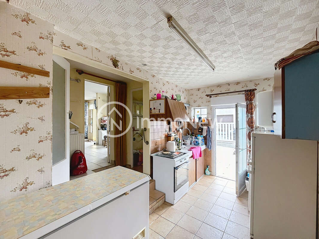 Une maison avec garage non attenant dans le centre de DONVILLE LES BAINS - photo 2