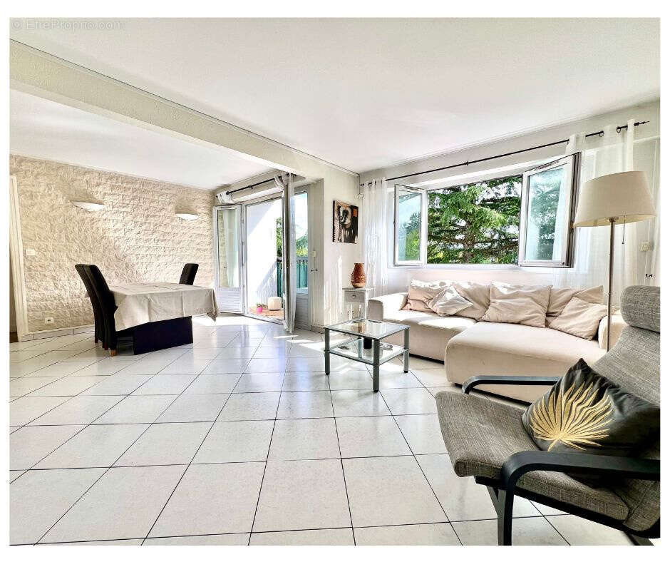 Appartement 88m2- dernier étage- balcon- cave - parking - photo 2