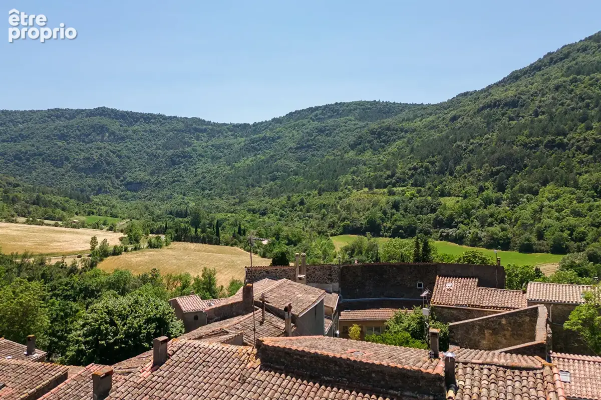 CARCASSONNE - GREFFEIL - Maison de village en pierre  T6 139m² (80m² hab.)  avec remise attenante et vue dégagée - photo 3