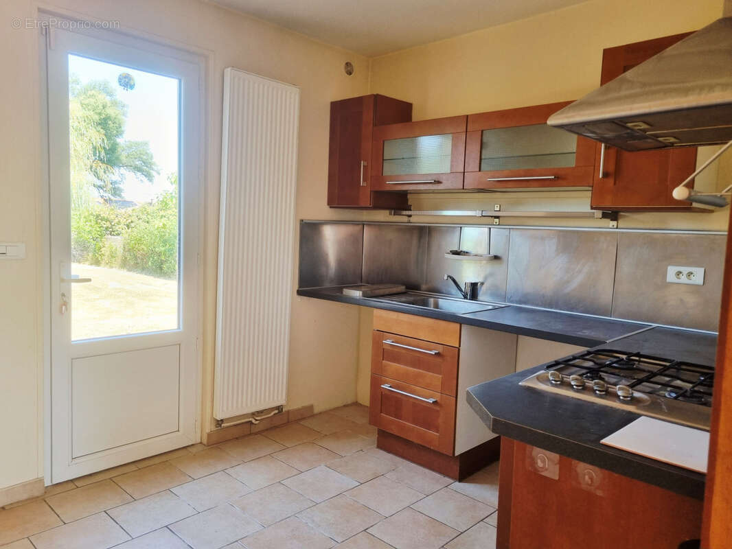 Maison mitoyenne par le garage - photo 3