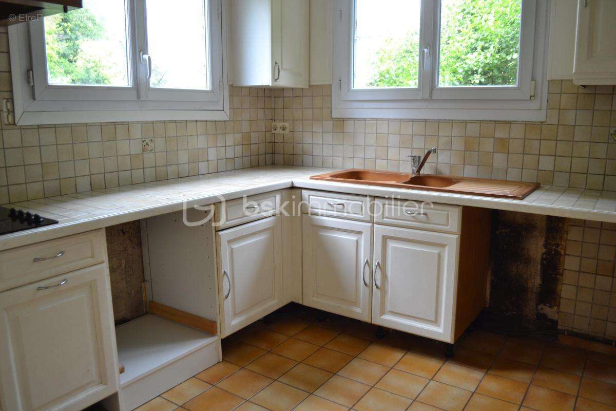 En exclusivité À vendre : Maison élevée sur sous-sol dans un quartier calme - photo 15