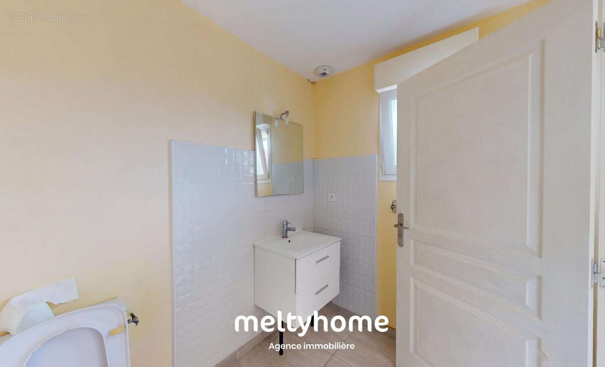 Maison 107 m² à Demouville  - photo 4