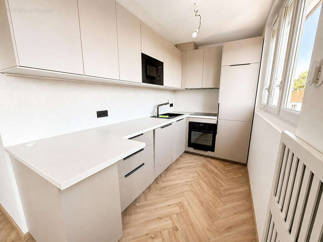 appartement 3 pièces dans une copropriété au pied de la gare d'Enghien-les-Bains - photo 3