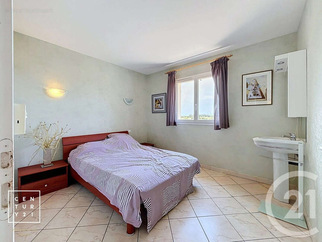 Maison 81 m² à Claira  - photo 14