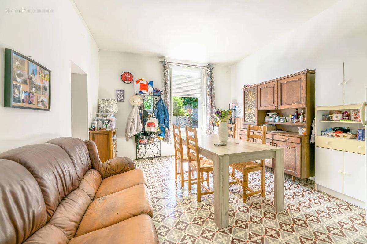 Maison de 5 pièces de 102 m² à Villechauve - photo 2