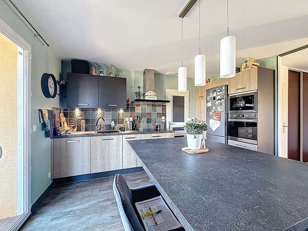 Maison à VILLIEU-LOYES-MOLLON