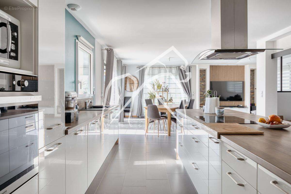 Maison semi plain-pied 7 pièces  169 m²  Avec jardin, terrasse et garage  SAINT PIERRE DE VARENGEVILLE 76480 - photo 5