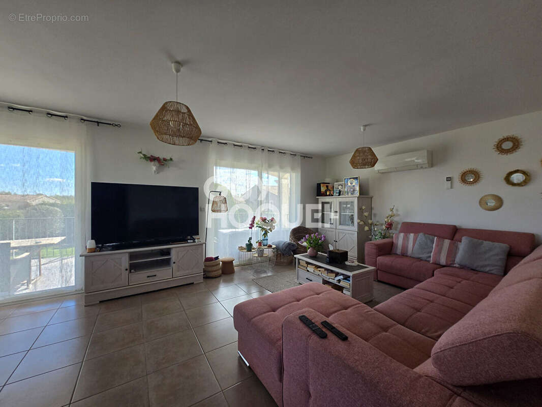 Maison à LAUDUN-L'ARDOISE