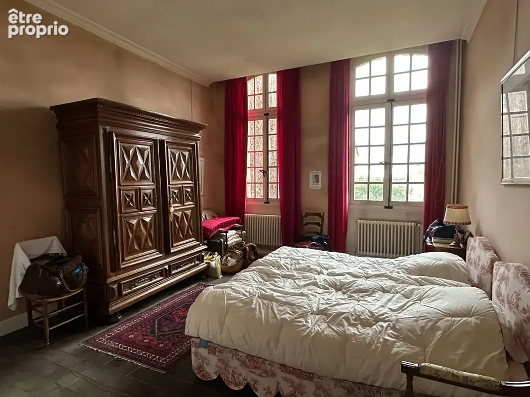 A vendre centre ville appartement de type 6 d'environ 190 m² avec cave, garage et jardin - photo 6