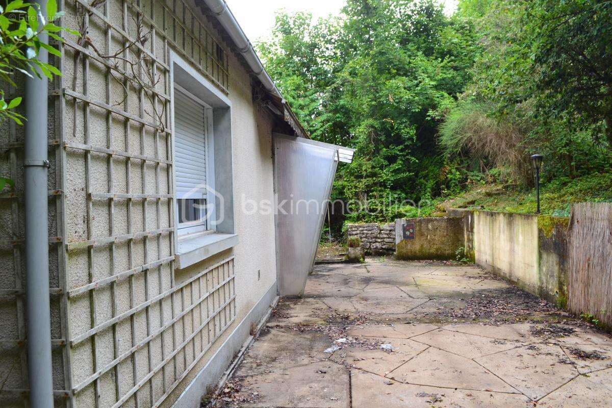 À vendre : Maison élevée sur sous-sol dans un quartier calme et recherché - photo 4