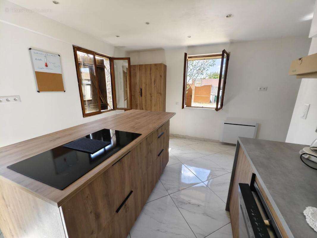 Maison 102 m² à Le Plessis-Hebert  - photo 2