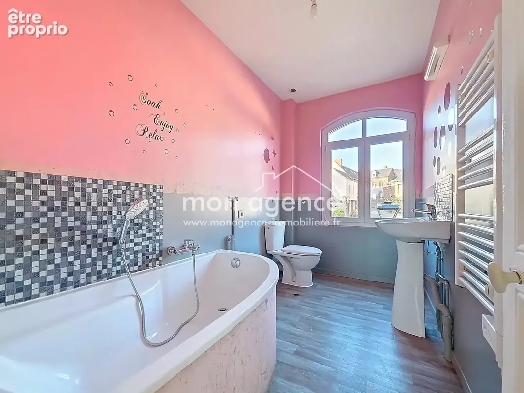Une maison familiale en plein centre-bourg - photo 9