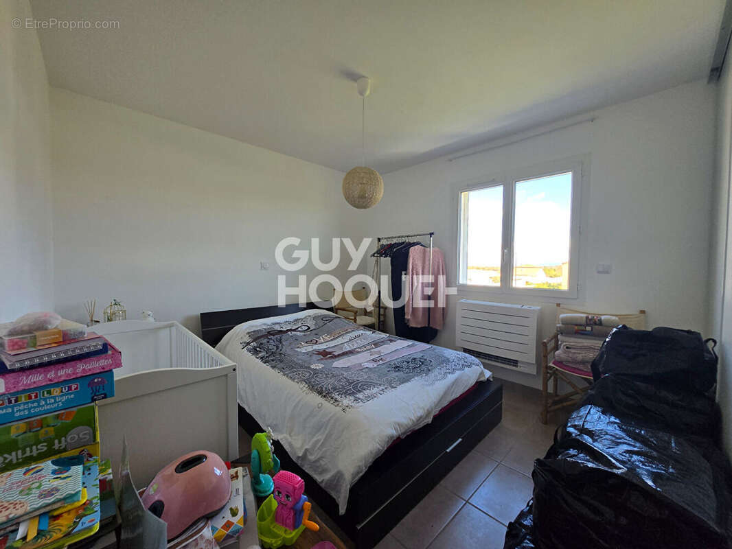 Maison à LAUDUN-L'ARDOISE