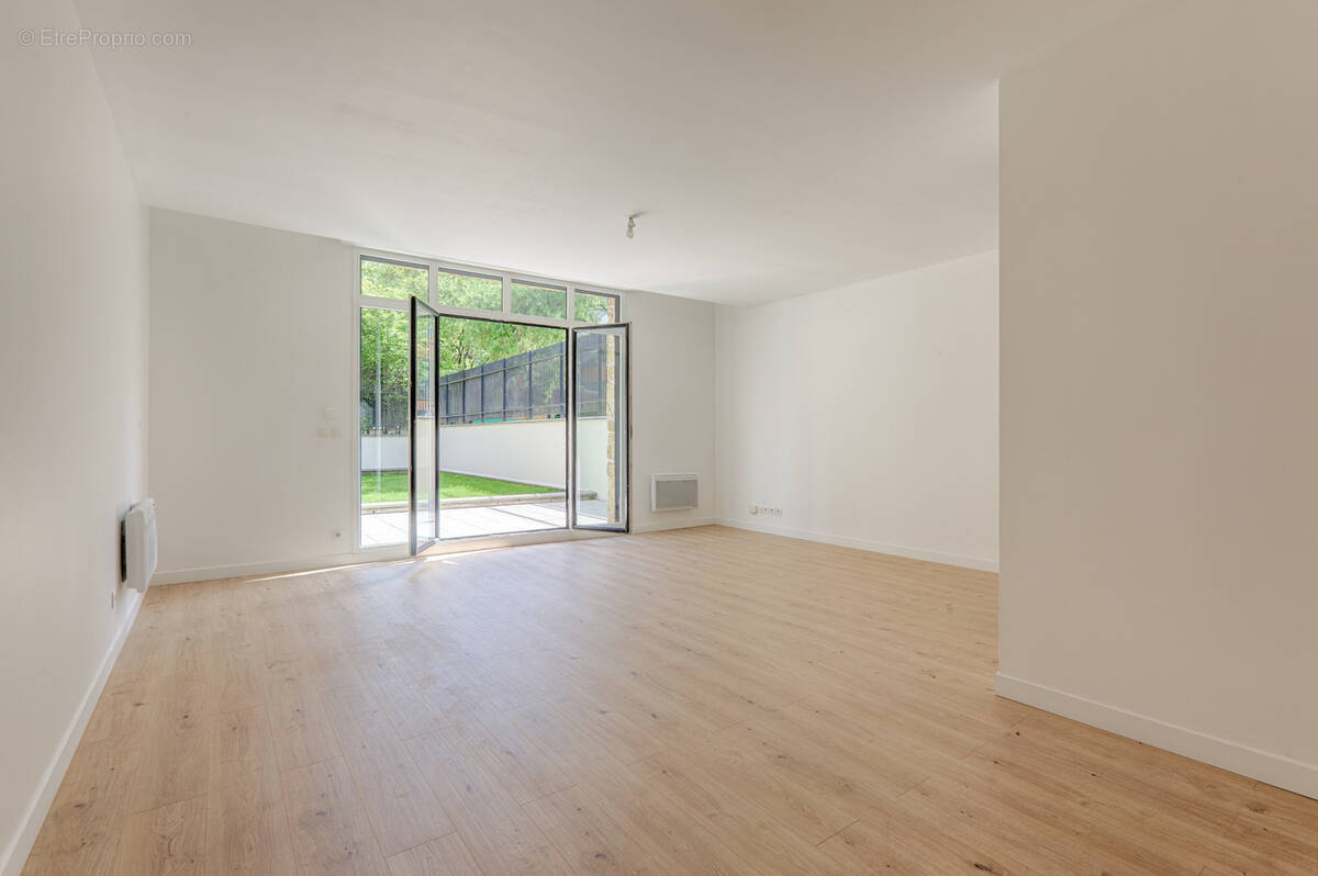 Duplex 5 pieces 118m2 avec 4 chambres et 75m2 de jardin, 2 parkings en sous-sol - photo 2