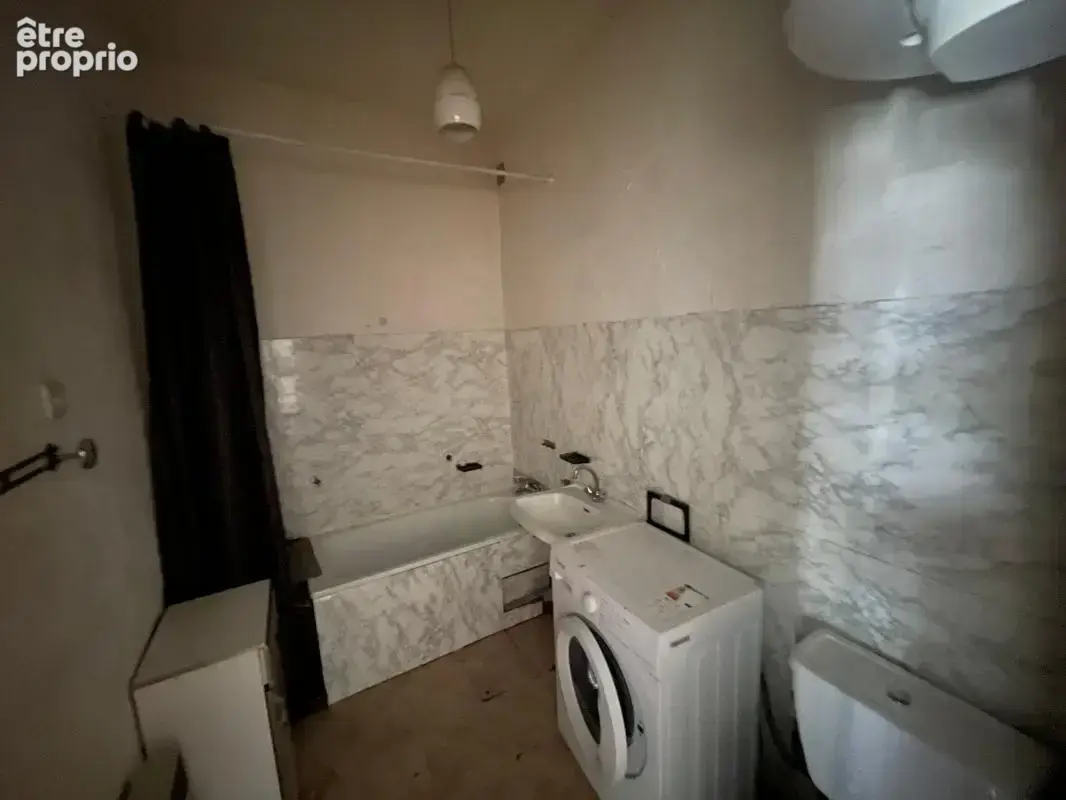 Appartement 32 m2 en rez-de-chaussee centre ville - photo 4