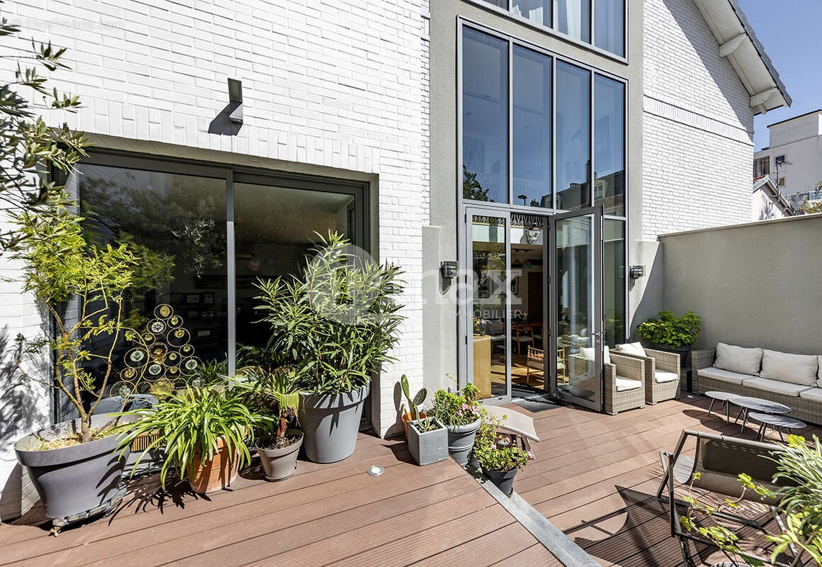 Maison à COURBEVOIE