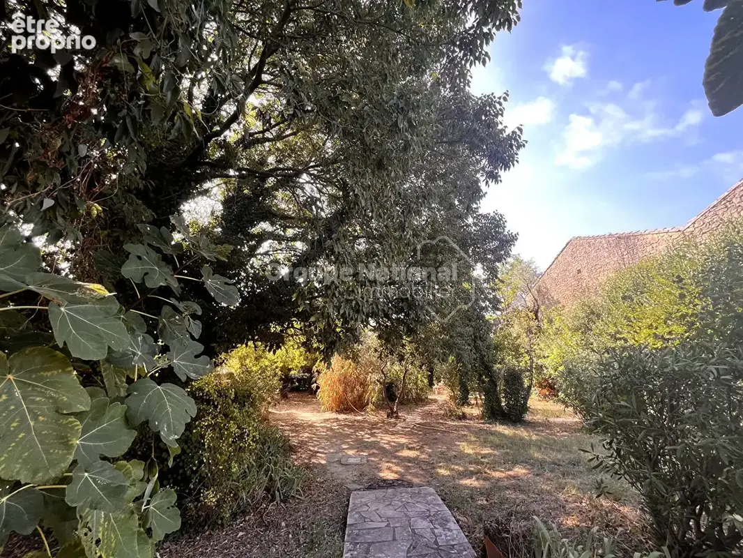Maison de plain pied avec piscine entourée d'un vaste parc arboré, Aigues Vives 4 pièce(s) - photo 6