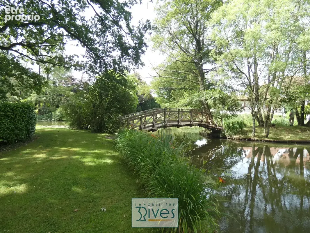 Propriété d'exception — Parc boisé de 1,3 hectare et étang privé - photo 7