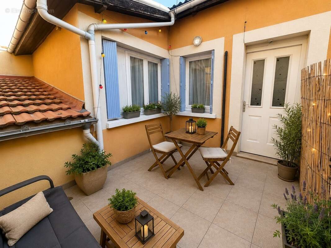 Appartement type maisonnette 54m2- terrasse - 1 chambre - mezzanine - buanderie - cave - photo 6