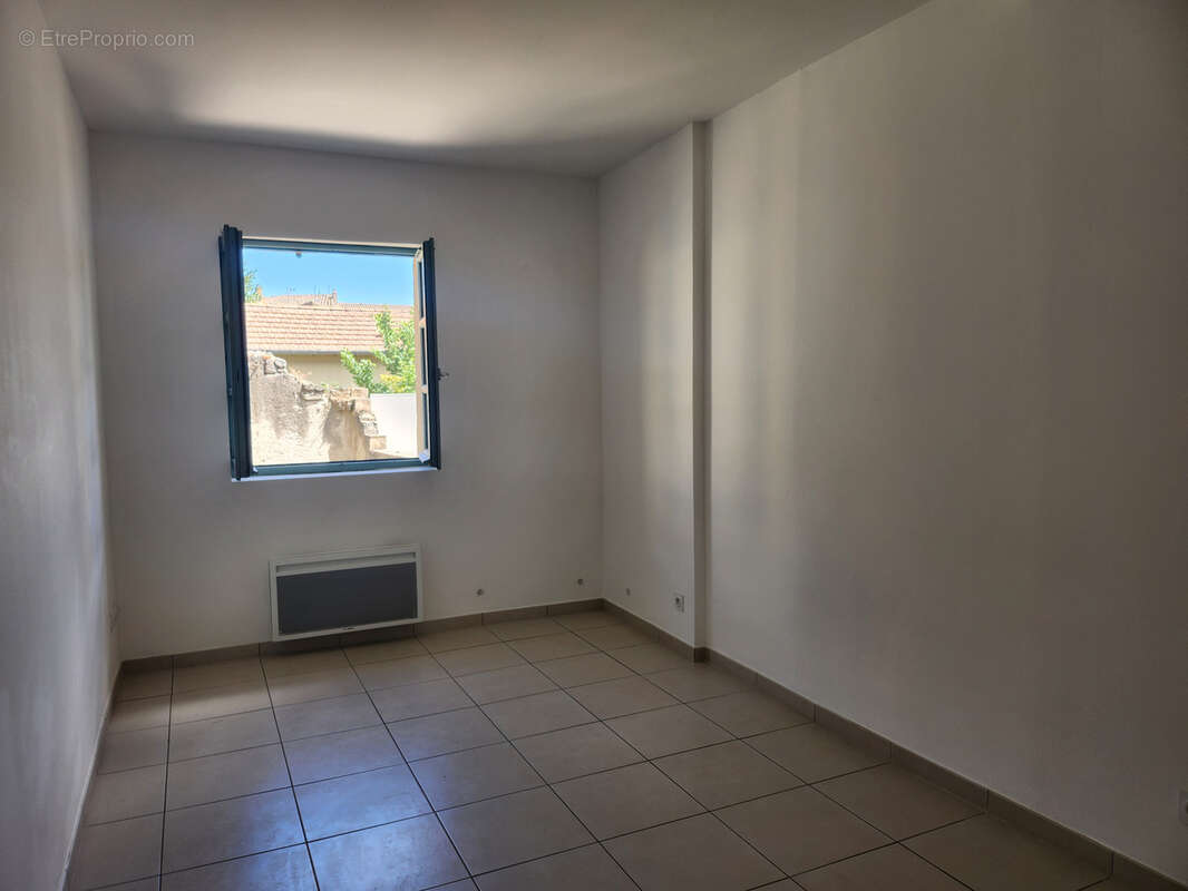 Appartement avec terrasse au 1er étage UZES centre - photo 25