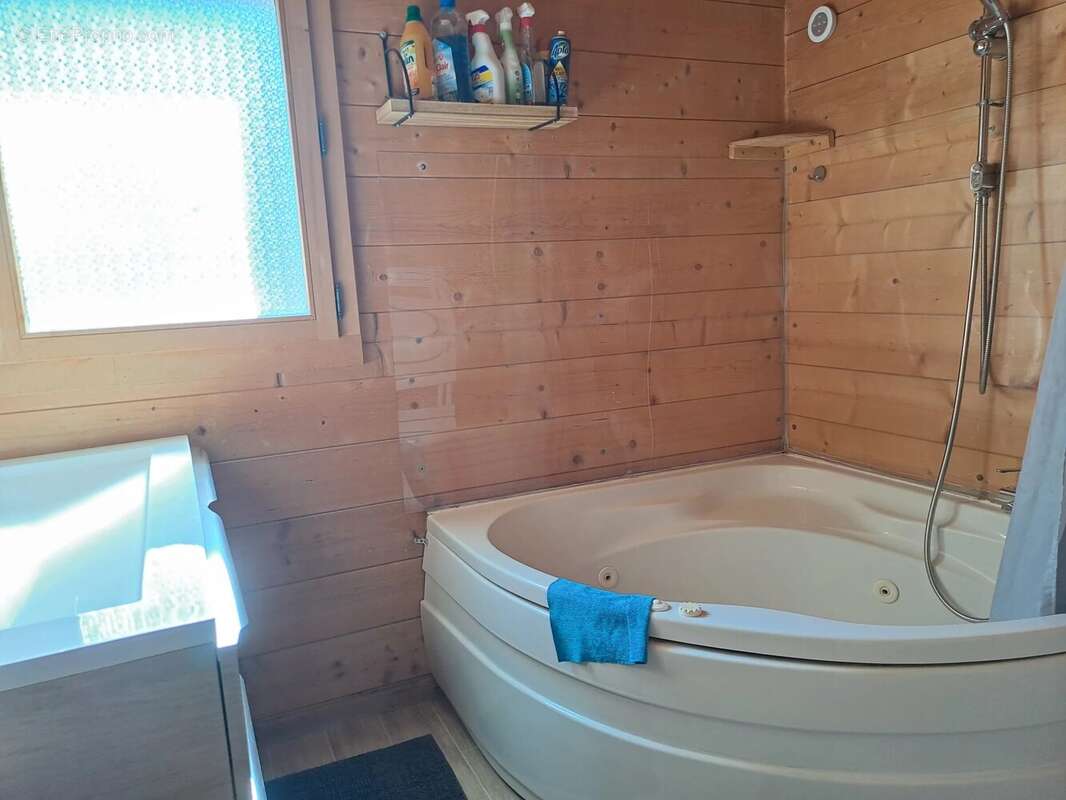 PREMANON : Chalet avec 2 logements et grand garge - photo 11