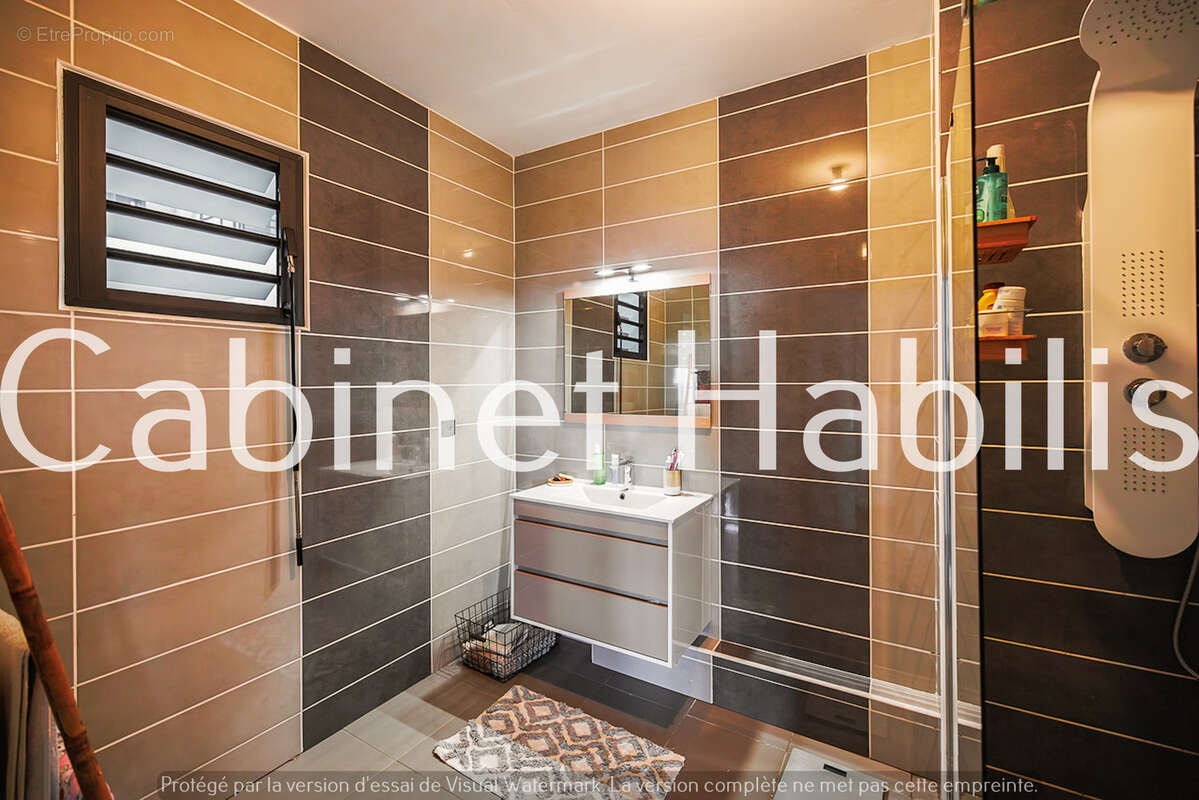 A vendre - un appartements de type t3 d'environ 71.03 m2 - sainte clotilde - 281 500 € - photo 10