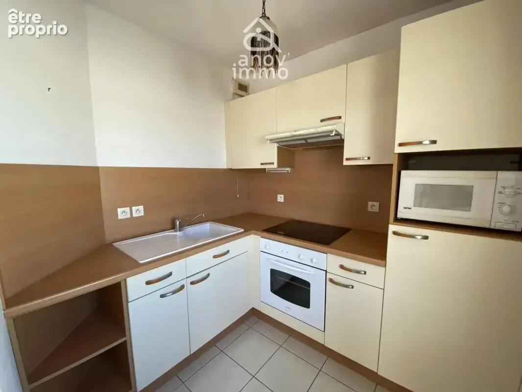 Appartement T3 avec terrasse, cave et parking proche plage e - photo 4