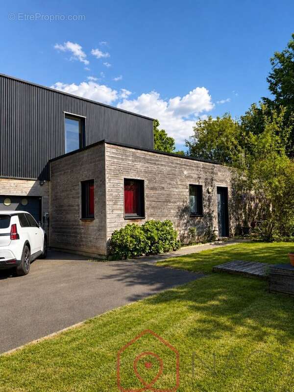 Maison contemporaine au cur du Golf du Tronchet  DPE A  Aucun travaux - photo 3