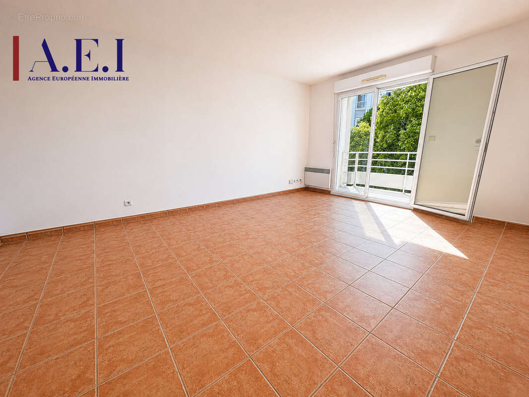 Appartement T2 avec terrasse et stationnement privatif - photo 4
