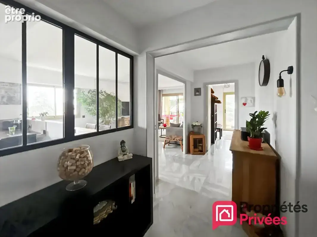 Appartement 3 pièces traversant avec terrasses, garage et cave - photo 6
