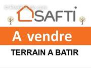 Photo 1 - Terrain à PLOUIGNEAU