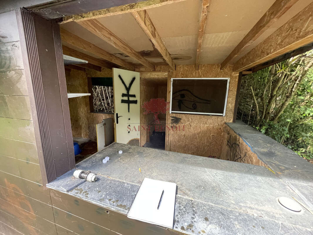 Maison de type t3 sur 2 niveaux et un appartement de type t2 sur une parcelle arboree de 6069m2 avec un bassin - photo 26