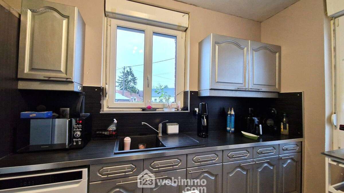 Elle est aménagée et... - Maison à PARGNY-LES-BOIS