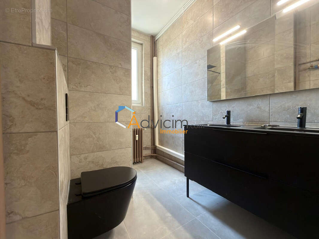 Appartement 75 m² à Saint-Etienne  - photo 8
