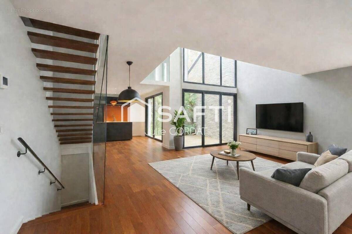 Photo 1 - Maison à LA GARENNE-COLOMBES