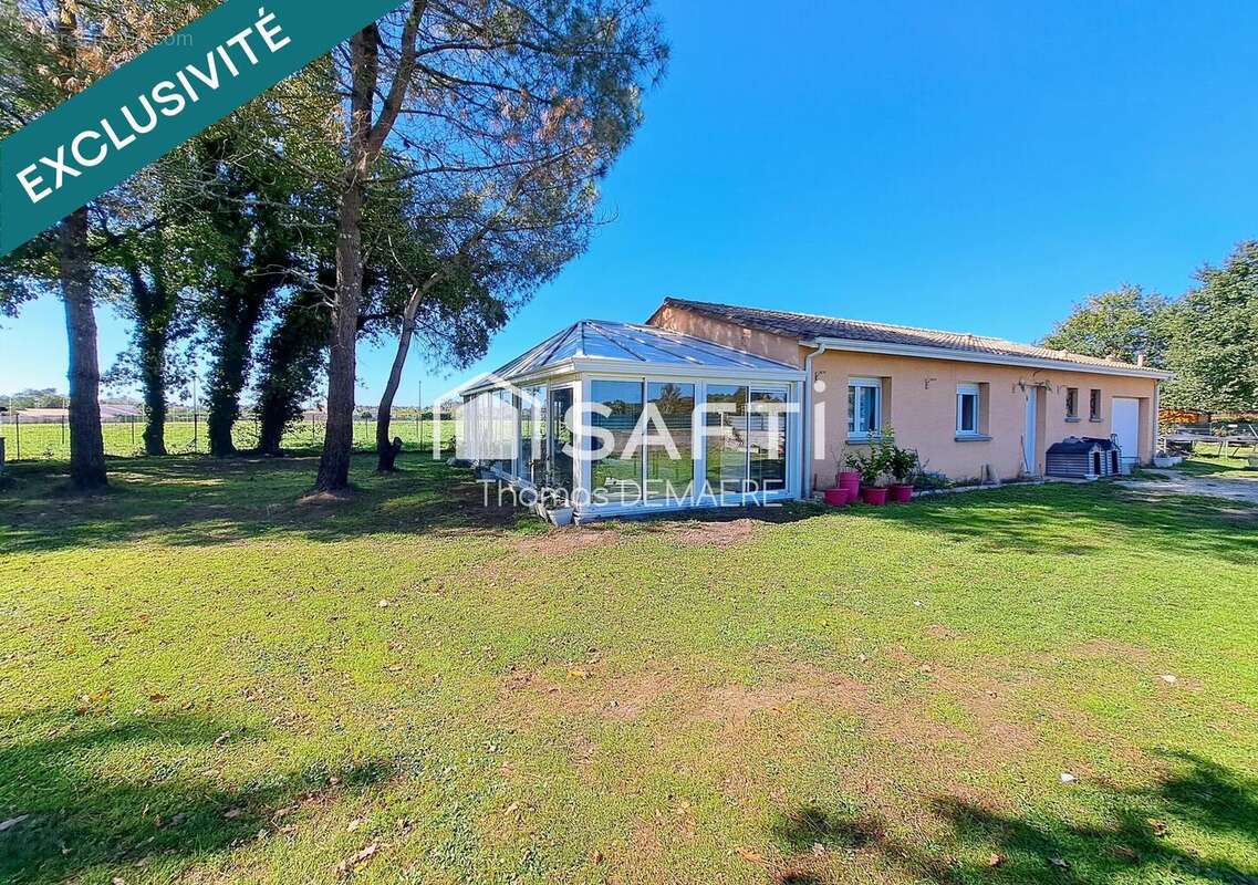 Photo 2 - Maison à BUSSAC-FORET