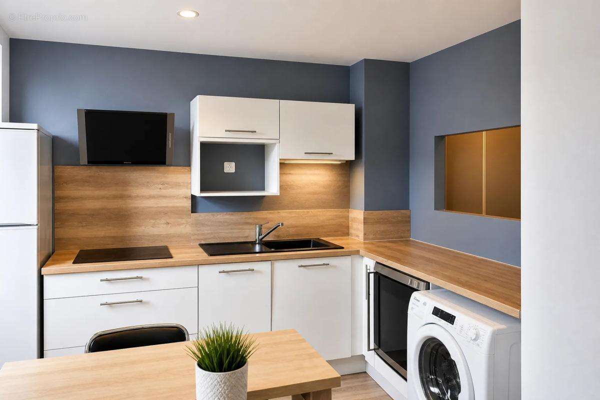 Appartement 3 pièces de 41 m² à Échirolles - photo 2