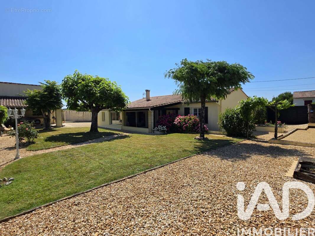 Photo 2 - Maison à ASNIERES-SUR-NOUERE