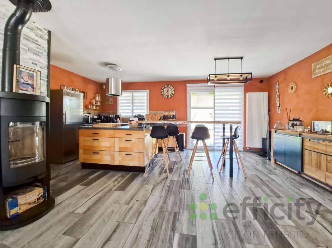 Maison 133 m² à Saint-Ouen-En-Belin  - photo 4
