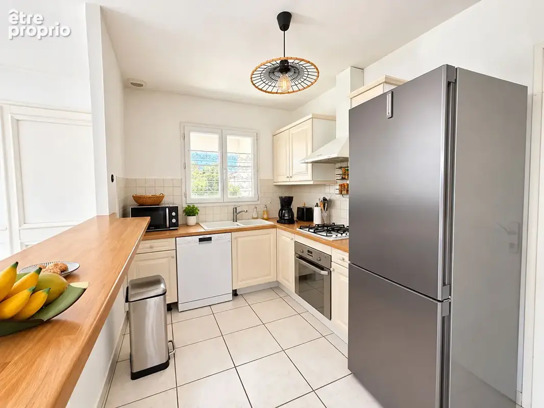 PROCHE COMMERCES - Maison de plain pied avec garage & jardin - photo 6