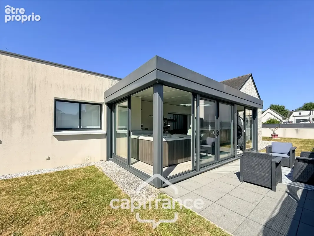 Maison contemporaine de plain-pied de 160 m² – 4 chambres – Véranda de 27 m² avec spa – Double garage – Carport – Noyal-Pontivy - photo 39